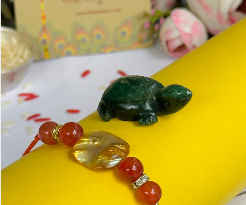 Rakhi to Boost Your Strength and Confidence with Red Onyx Shell Rakhi & Green Jade Turtle